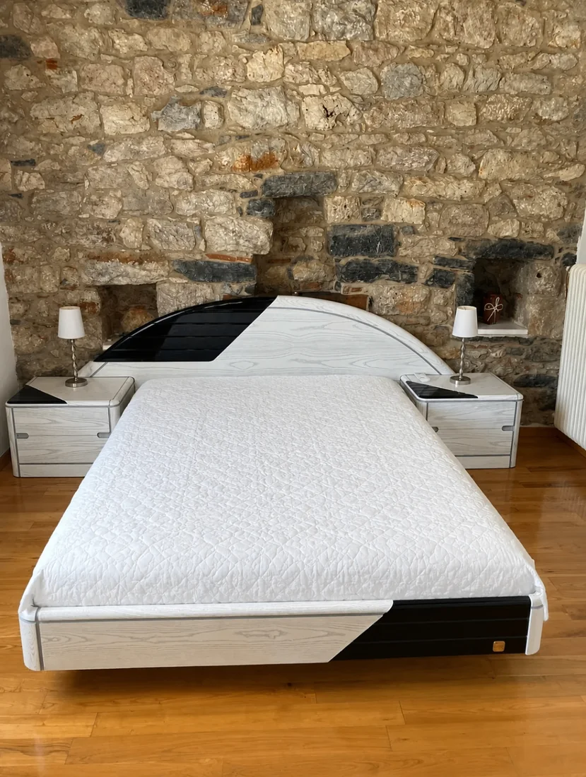 Master bedroom at Villa Arcadia Double bed in a stone-walled bedroom at Villa Arcadia